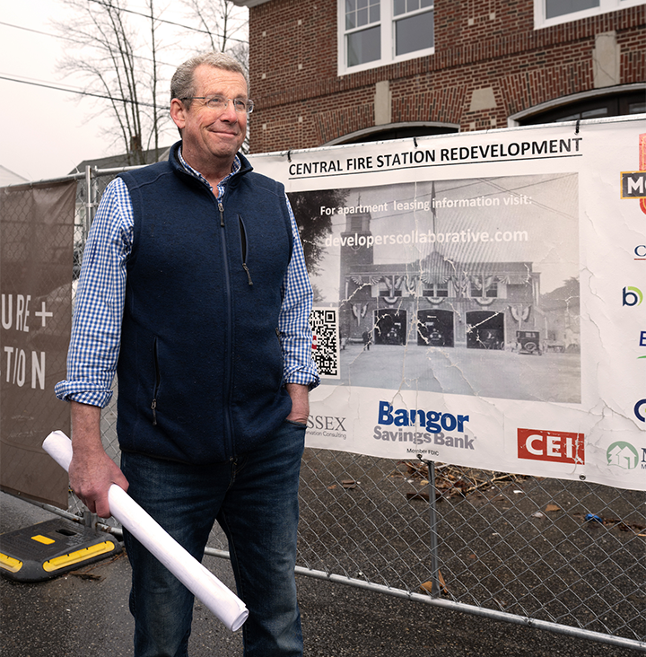 Man standing in front of building construction