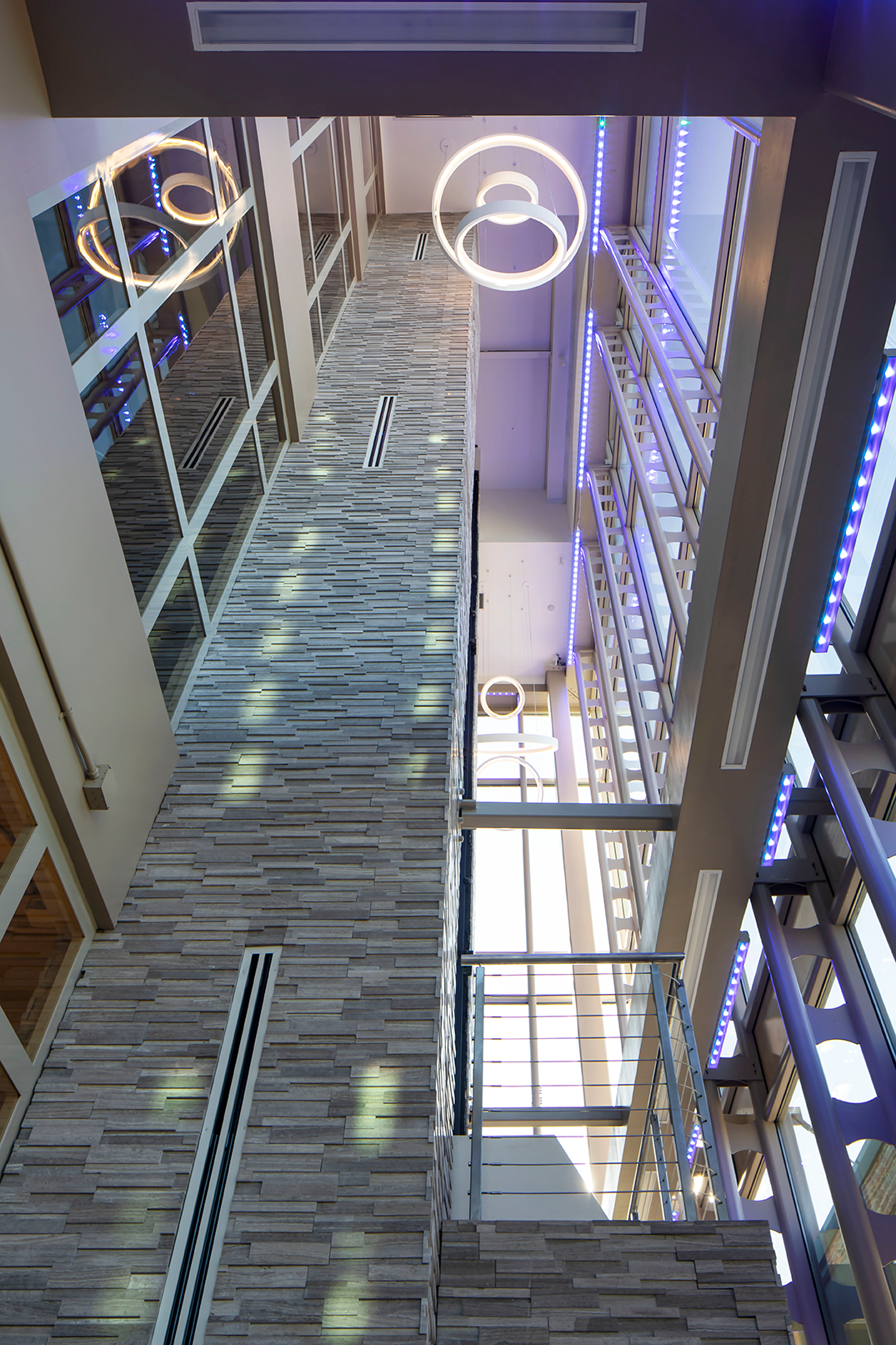 Room with high ceilings and circular lights