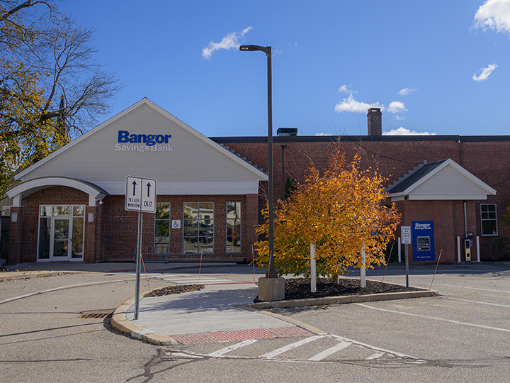 Parking lot entrance and drive up lane at Bangor Savings Bank in Saco
