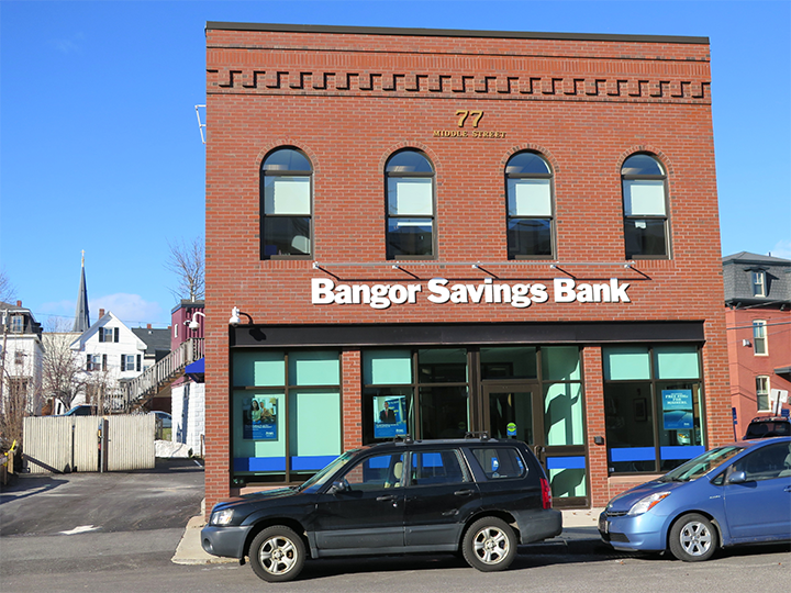 Street‑level view of the Bangor Savings Bank branch at 77 Middle Street in Portland, Maine, with main entrance and signage